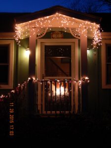 Christmas-lights-w-dog-prints-on-door-2015-small